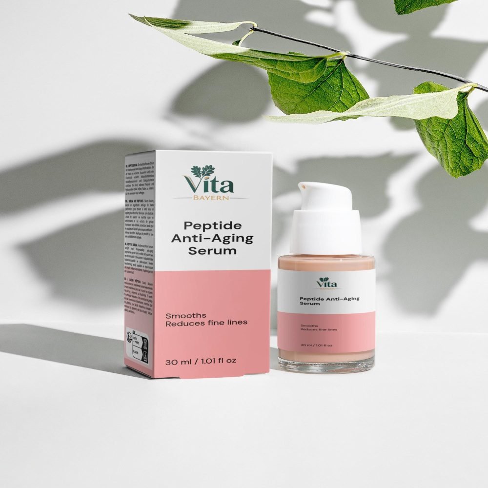 A bottle and box of Vita Elixia Peptide Anti-Aging Serum displayed under the soft shadow of green leaves