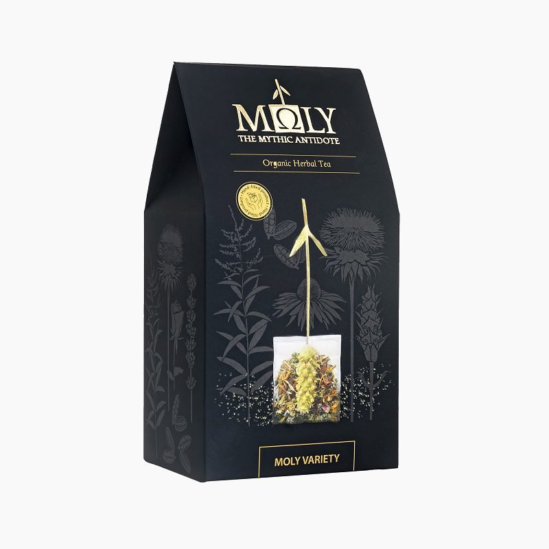 Moly Variety Organic Herbal Tea packaging featuring a single visible tea bag with whole herbs and flowers against a matte black box with gold botanical line art