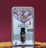 Tarvand Saffron Extract bottle in premium retail packaging featuring a purple crocus illustration, set against a deep red background with gold glitter accents