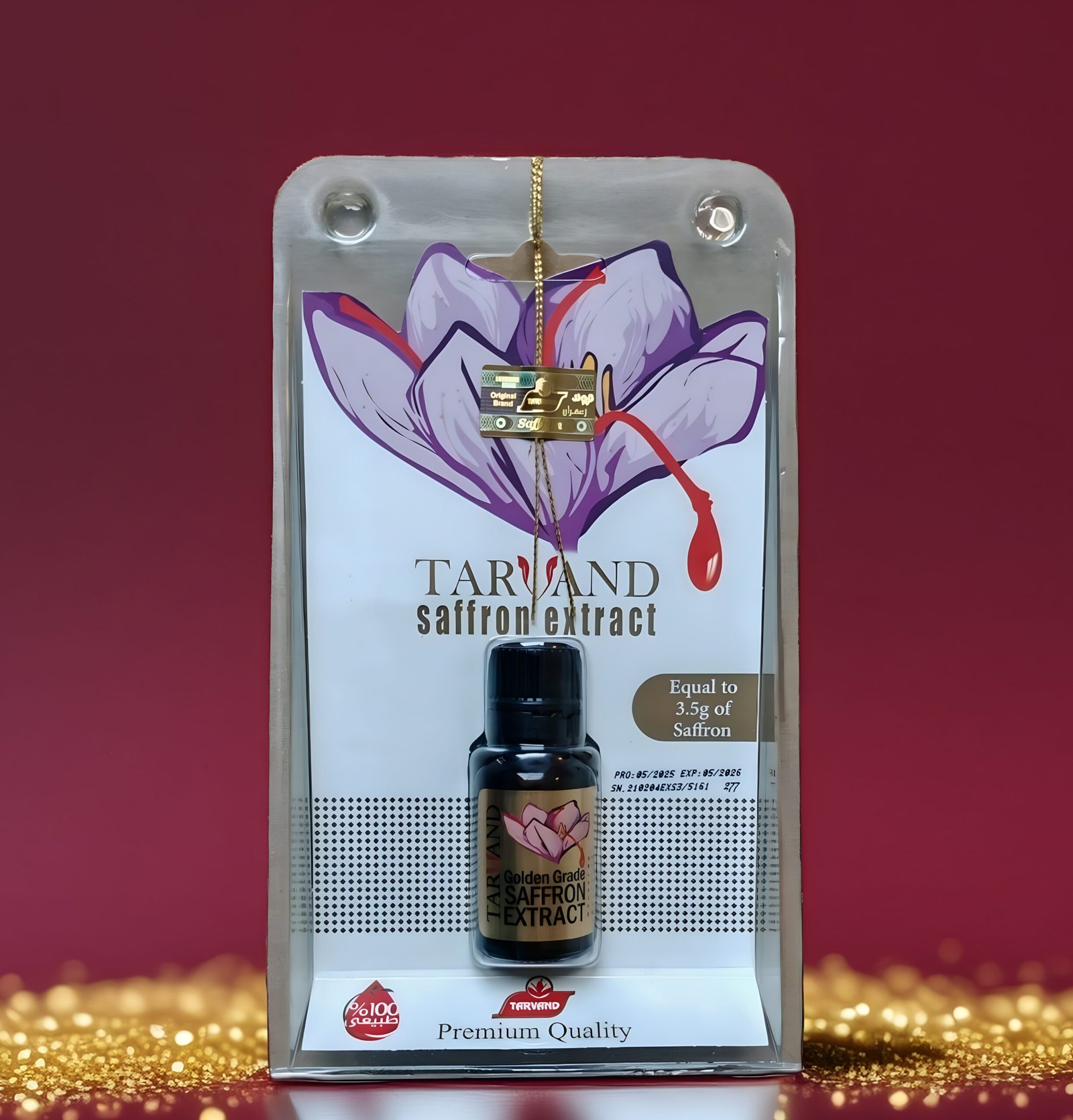 Tarvand Saffron Extract bottle in premium retail packaging featuring a purple crocus illustration, set against a deep red background with gold glitter accents