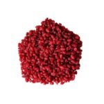 A vibrant mound of whole, deep-red dried organic barberries